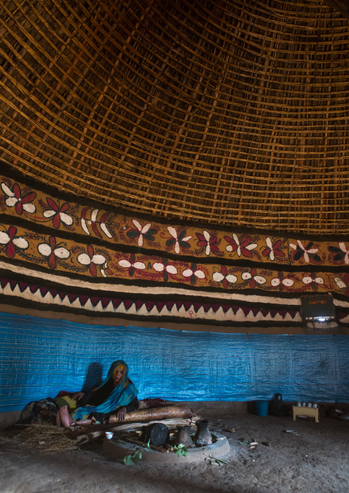 Ethiopia, Kembata, Alaba Kuito, ethiopian woman inside her traditional painted and decorated house