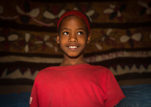 Ethiopia, Kembata, Alaba Kuito, ethiopian girl inside her traditional painted and decorated house