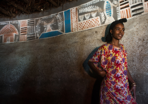 Ethiopia, Kembata, Alaba Kuito, ethiopian woman inside her traditional painted and decorated house