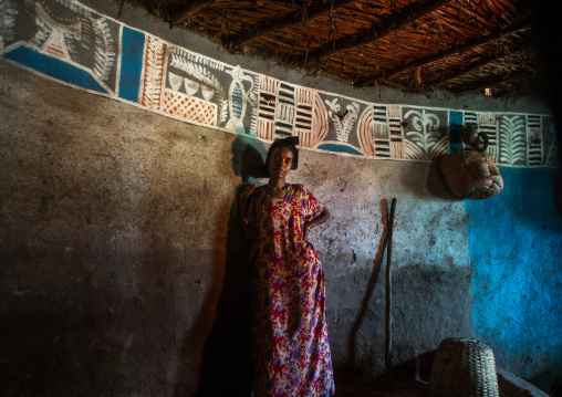 Ethiopia, Kembata, Alaba Kuito, ethiopian woman inside her traditional painted and decorated house