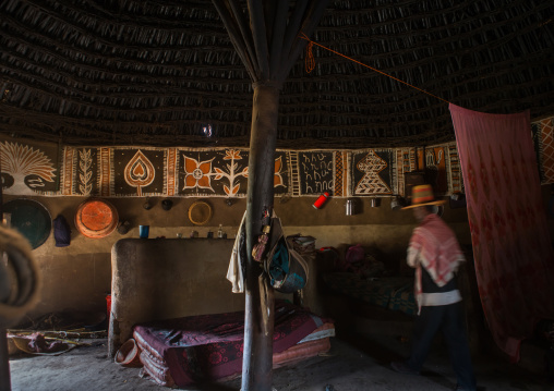 Ethiopia, Kembata, Alaba Kuito, ethiopian muslim man inside his traditional painted and decorated house