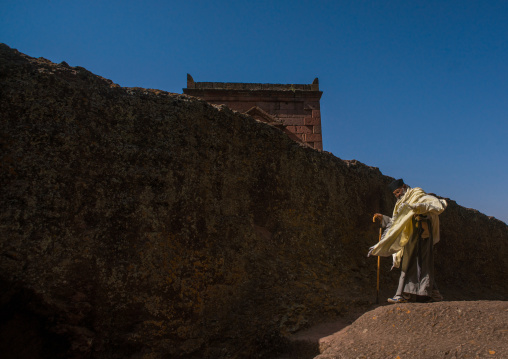 Ethiopian priest in a rock church during kidane mehret orthodox celebration, Amhara region, Lalibela, Ethiopia