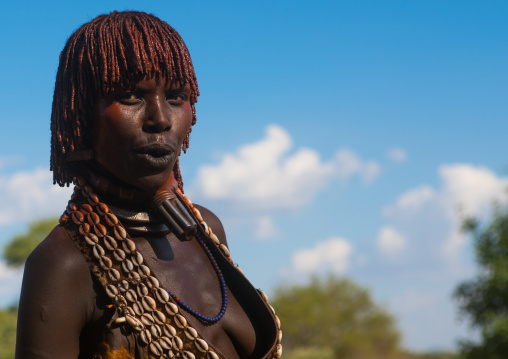 Hamer tribe woman attending a bull jumping ceremony, Omo valley, Turmi, Ethiopia