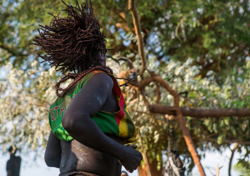 Hamer tribe women dancing during a bull jumping ceremony, Omo valley, Turmi, Ethiopia