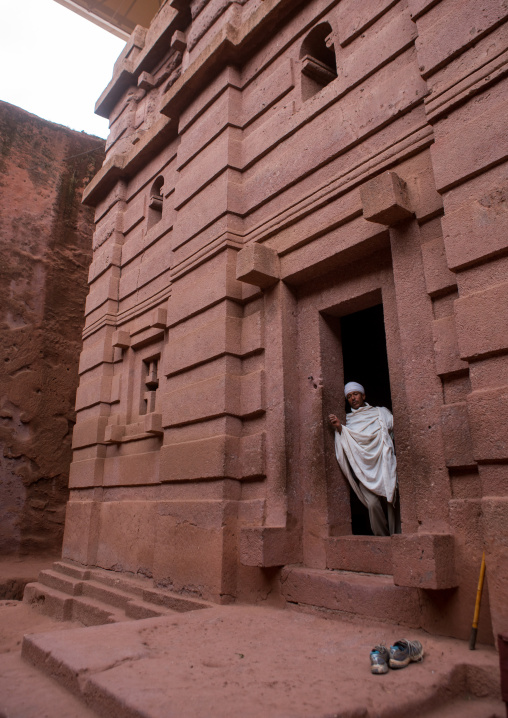 Ethiopian priest in a rock church during kidane mehret orthodox celebration, Amhara region, Lalibela, Ethiopia