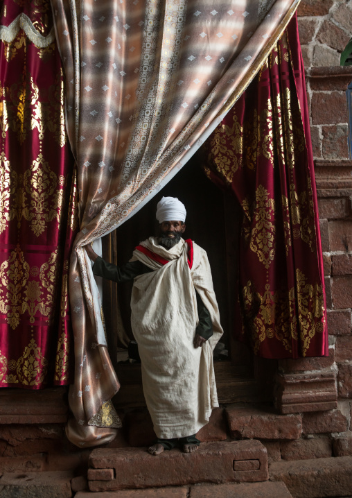 Ethiopian orthodox priest in nakuto lab rock church, Amhara region, Lalibela, Ethiopia