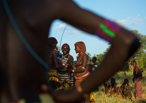 Hamer tribe women attending a bull jumping ceremony, Omo valley, Turmi, Ethiopia