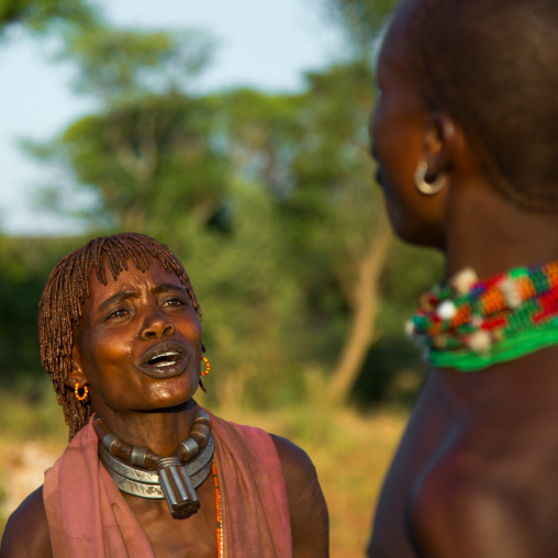 Hamer tribe woman waiting to be whipped during a bull jumping ceremony, Omo valley, Turmi, Ethiopia