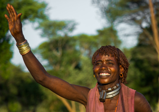 Hamer tribe woman dancing during a bull jumping ceremony, Omo valley, Turmi, Ethiopia