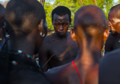 Hamer tribe men attending a bull jumping ceremony, Omo valley, Turmi, Ethiopia