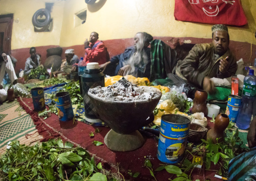 Ethiopian people chewing khat during a sufi ceremony lead by Amir Redwan in Ummi Tahir Nabigar, Harari Region, Harar, Ethiopia