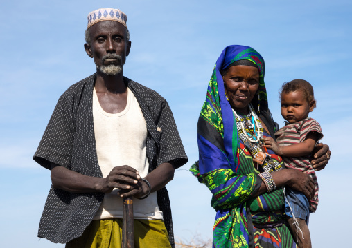 Issa tribe man with his wife and child, Afar region, Yangudi Rassa National Park, Ethiopia