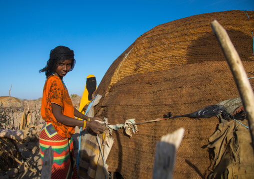 Afar tribe women building a hut, Afar region, Mile, Ethiopia