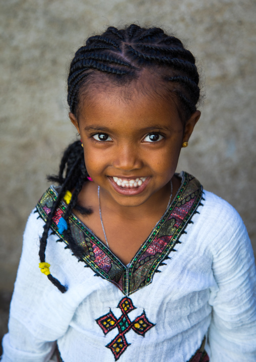 Portrait of an ethiopian child girl in traditional clothing, Afar region, Assaita, Ethiopia