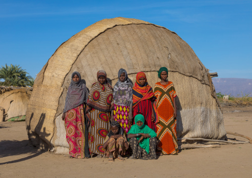 Portrait of Afar tribe women in front of their traditional hut, Afar region, Afambo, Ethiopia