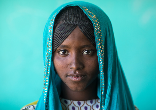 Portrait of an Afar tribe girl with braided hair and a blue veil, Afar region, Semera, Ethiopia