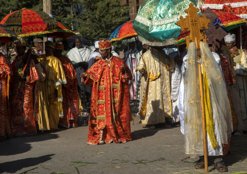 Ethiopian orthodox priests procession celebrating the colorful Timkat epiphany festival, Amhara region, Lalibela, Ethiopia