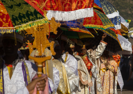 Ethiopian orthodox priests procession celebrating the colorful Timkat epiphany festival, Amhara region, Lalibela, Ethiopia