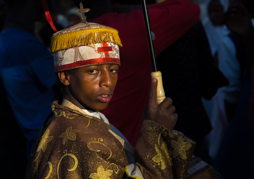 Ethiopian orthodox priest celebrating the colorful Timkat epiphany festival, Amhara region, Lalibela, Ethiopia