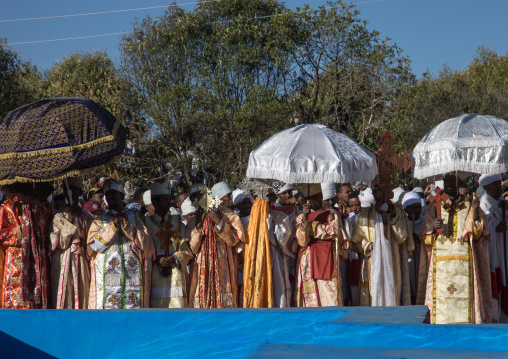 Priests in front of the pool during Timkat celebrations of epiphany, Amhara region, Lalibela, Ethiopia