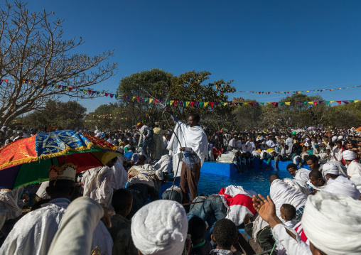 Holy water sprayed onto the crowd attending Timkat celebrations of epiphany, Amhara region, Lalibela, Ethiopia