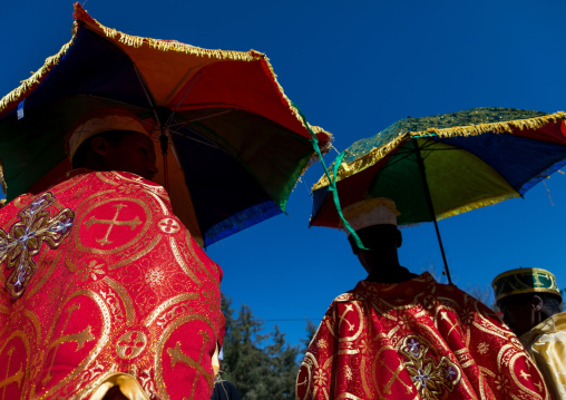 Ethiopian orthodox priests procession celebrating the colorful Timkat epiphany festival, Amhara region, Lalibela, Ethiopia