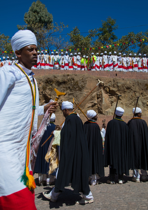 Ethiopian orthodox priests in line celebrating the colorful Timkat epiphany festival, Amhara region, Lalibela, Ethiopia