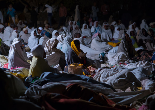 Orthodox pilgrims at Timkat festival during nightime, Amhara region, Lalibela, Ethiopia