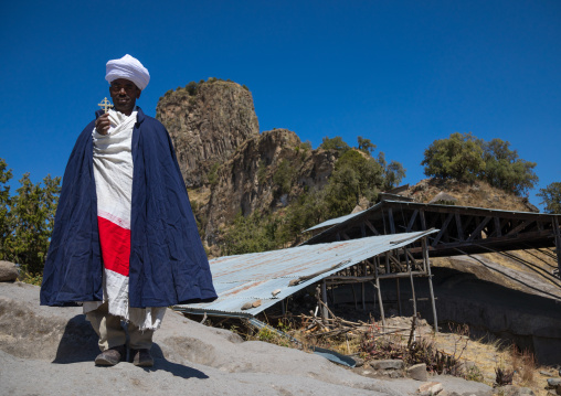 Priest of the ethiopian orthodox church in Asheten mariam rock hewn church, Amhara region, Lalibela, Ethiopia