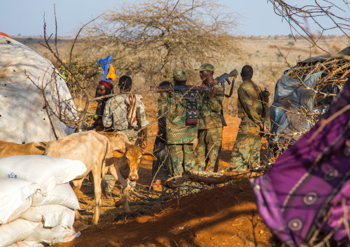 Soldiers with kalashnikovs during the Gada system ceremony, Oromia, Yabelo, Ethiopia