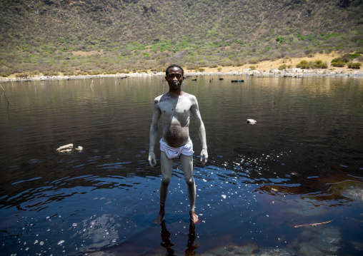 Volcano crater where Borana tribe men dive to collect salt, Oromia, El Sod, Ethiopia