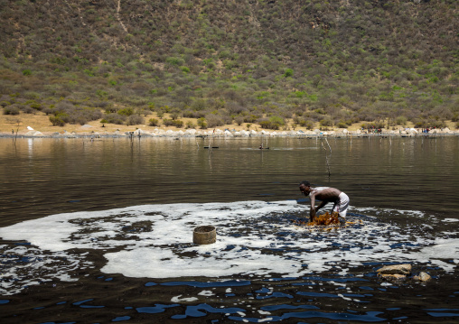 Volcano crater where Borana tribe men dive to collect salt, Oromia, El Sod, Ethiopia