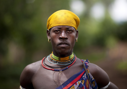 Menit man wearing traditional clothes, Tum market, Omo valley, Ethiopia