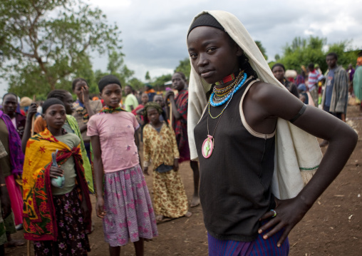 Veiled dizi girl, Tum market, Omo valley, Ethiopia