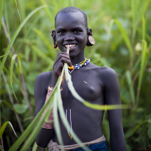 Surma girl, Tulgit, Omo valley, Ethiopia