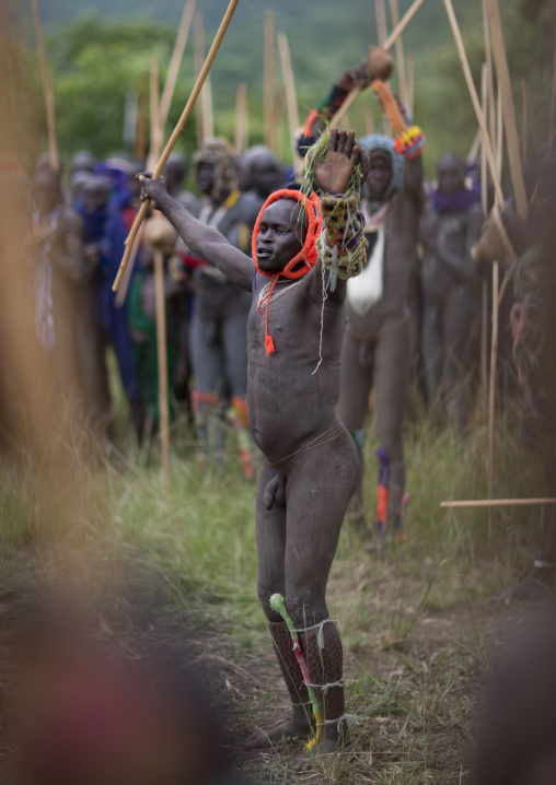 Suri tribe warriors fighting during a donga stick ritual, Omo valley, Tulgit, Ethiopia