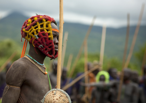 Suri tribe warriors fighting during a donga stick ritual, Omo valley, Tulgit, Ethiopia