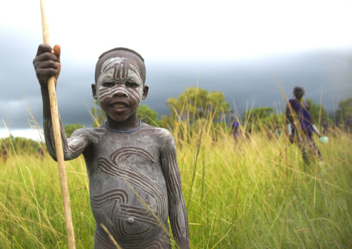 Suri Boy Imitating The Adult Warriors, Omo Valley, Ethiopia