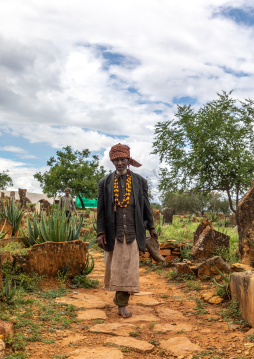 Oromo man in the cemetery of the shrine of sufi Sheikh Hussein , Oromia, Sheik Hussein, Ethiopia