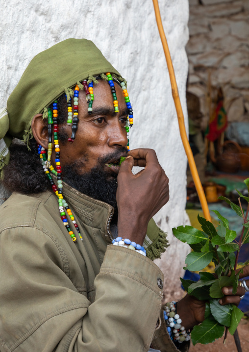 Oromo pilgrim chewing khat in Sheikh Hussein shrine, Oromia, Sheik Hussein, Ethiopia