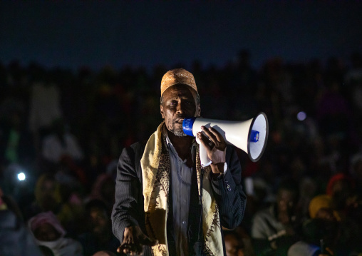 Oromo pilgrims praying in the night in Sheikh Hussein shrine, Oromia, Sheik Hussein, Ethiopia