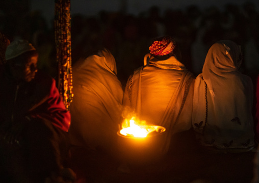 Oromo pilgrims praying in the night during the pilgrimage, Oromia, Sheik Hussein, Ethiopia