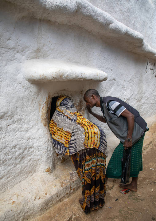 Oromo pilgrims looking inside the shrine which hosts the tomb of sufi Sheikh Hussein , Oromia, Sheik Hussein, Ethiopia