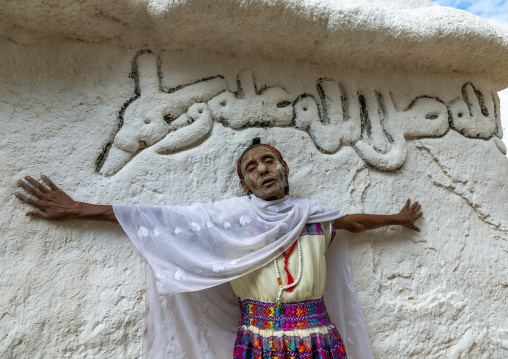 Oromo pilgrim woman in Sheikh Hussein shrine with jarawa powder on the face, Oromia, Sheik Hussein, Ethiopia