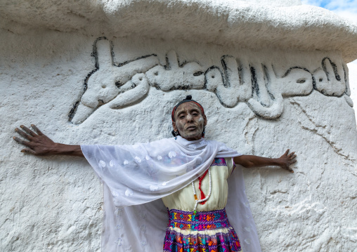 Oromo pilgrim woman in Sheikh Hussein shrine with jarawa powder on the face, Oromia, Sheik Hussein, Ethiopia