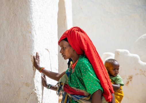 Oromo pilgrims women praying in Sheikh Hussein shrine, Oromia, Sheik Hussein, Ethiopia