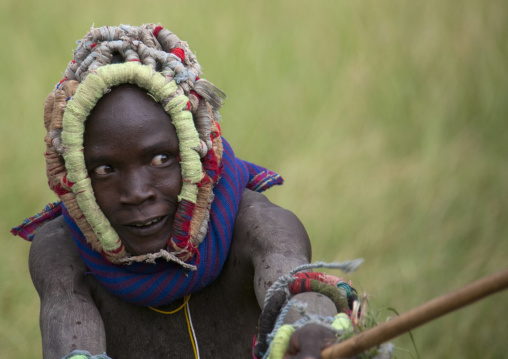 Suri tribe warriors fighting during a donga stick ritual, Omo valley, Tulgit, Ethiopia