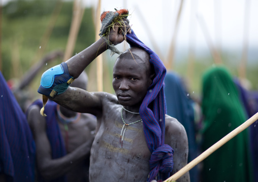 Suri tribe warriors fighting during a donga stick ritual, Omo valley, Tulgit, Ethiopia