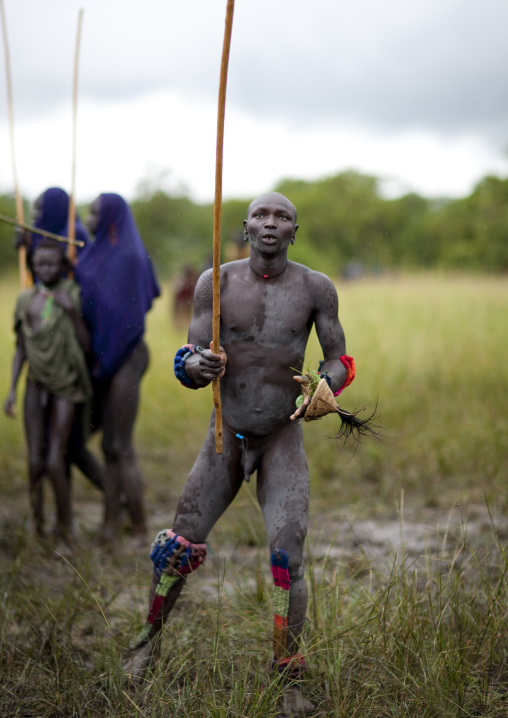 Suri tribe warriors fighting during a donga stick ritual, Omo valley, Tulgit, Ethiopia