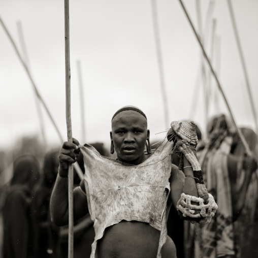 Suri tribe warriors fighting during a donga stick ritual, Omo valley, Tulgit, Ethiopia